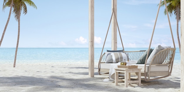 Hanging sofa on sand beach with palm ad sea view