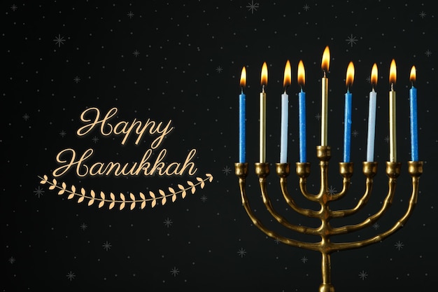 hanukkah candle on a dark background created using generative ai technology