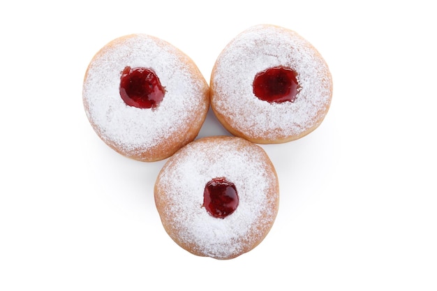 Hanukkah doughnuts with jelly and sugar powder on white background top view