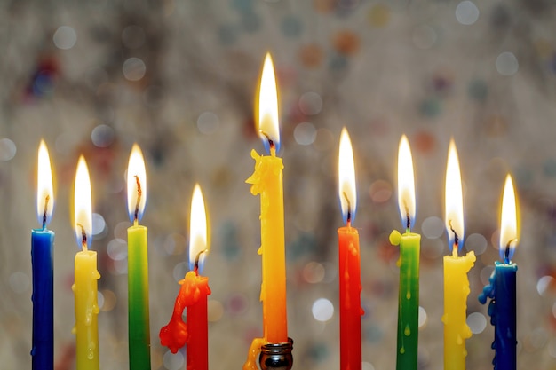 Hanukkah menorah with burning candles