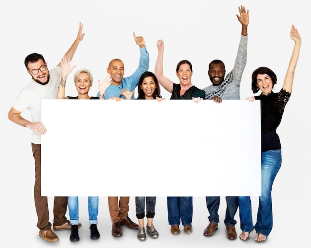 Happiness group of people arms raised and holding blank banner