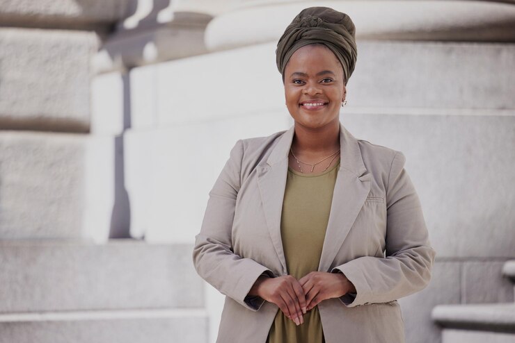 Photo happiness lawyer and black woman in city with confidence or vision for empowerment portrait positive and african female attorney with smile for career in outside courtroom for justice as attorney
