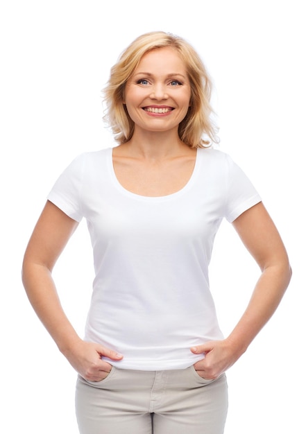 happiness and people concept - smiling woman in blank white t-shirt