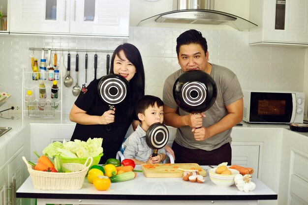 Happiness young family and children at kitchen in holiday weekend