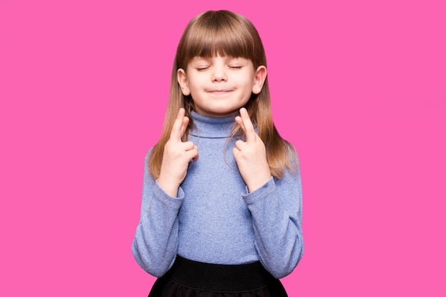 A happy active young kid posing