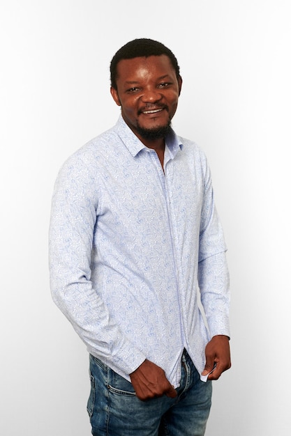 Happy african american black man with small beard in casual bright shirt isolated white background