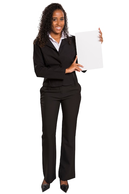 Happy African American business woman holding placard isolated