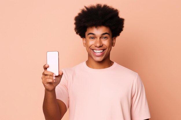 Happy african american teen student holding mobile cell phone pointing finger