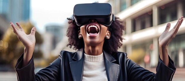 Happy African American woman in a dress using VR glasses and controlling space with her hands enjoys game and explores city Online app gadget virtual real