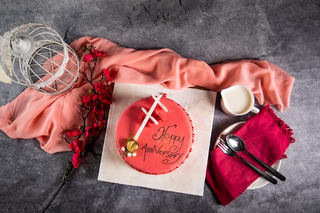 Happy anniversary Red Pearl Cake or women day and valentine celebration served on board isolated on napkin top view of cafe bake food