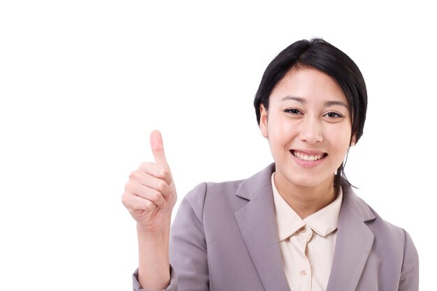 Happy asian caucasian business woman giving thumb up hand gesture