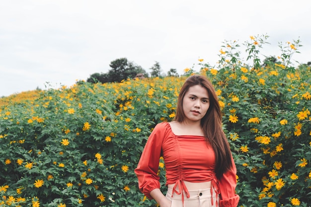 Happy  Asian girls  in the flower garden