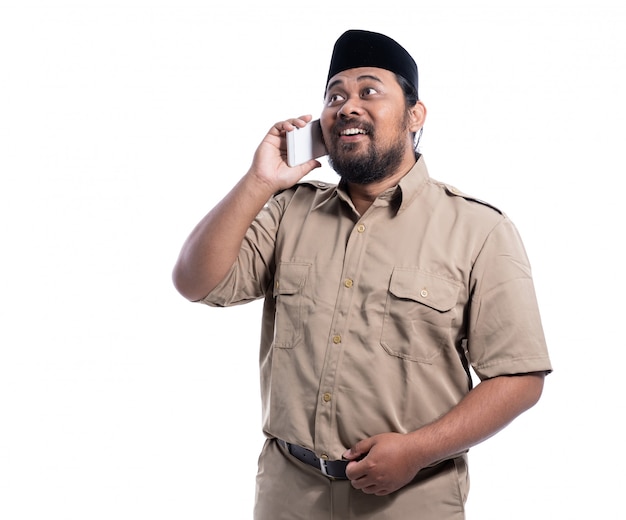 Happy asian man wearing a khaki uniform