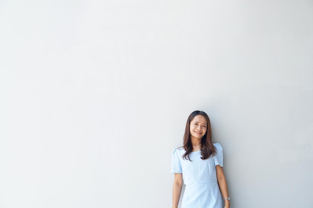 Happy Asian woman in a coffee shop text input background