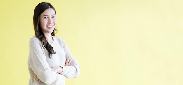 Happy asian woman smiling and looking at camera