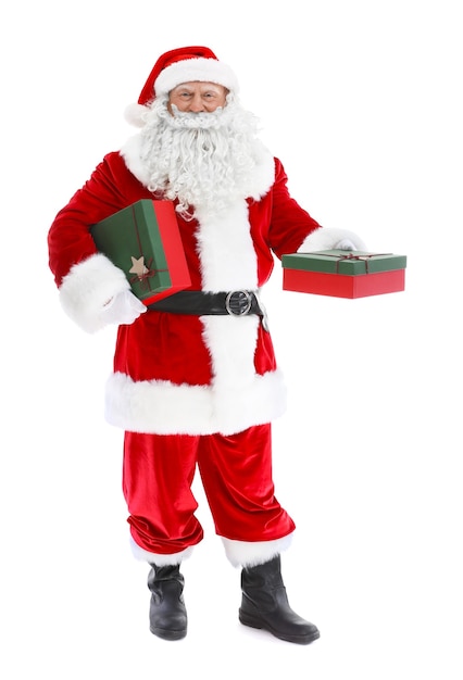 Happy authentic Santa Claus holding gift boxes