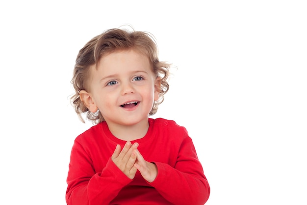 Happy baby wearing red t-shirt 