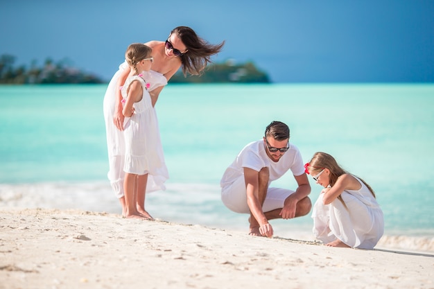 Happy beautiful family on the beach