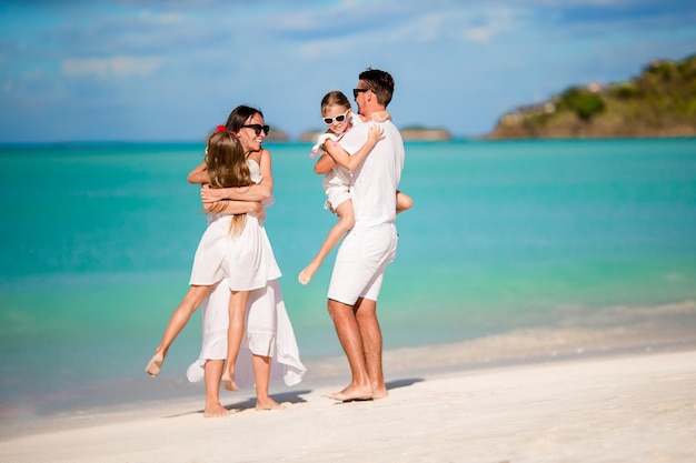 Happy beautiful family on the beach