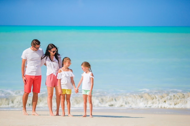 Happy beautiful family on the beach