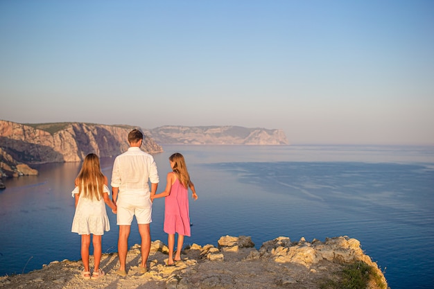 Happy beautiful family on a tropical beach vacation