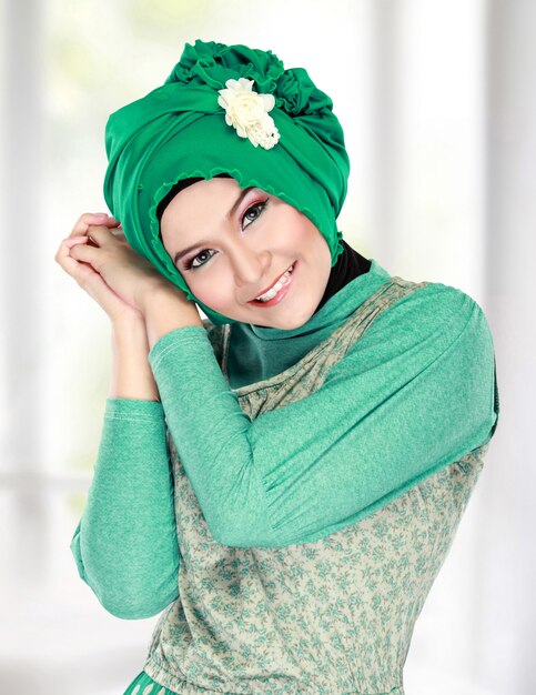 Happy beautiful muslim woman smiling