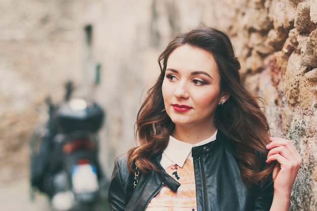 Happy beautiful woman walking joyful and cheerful smiling in Rome