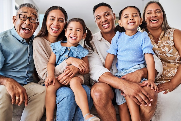 Happy big family and portrait smile for relationship happiness in quality bonding time together at home Parents grandparents and kids smiling for relaxing holiday break or free time at the house
