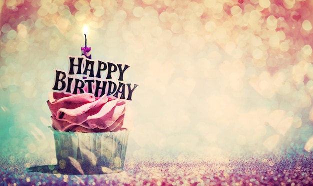 Photo happy birthday cupcake on glitter colorful background