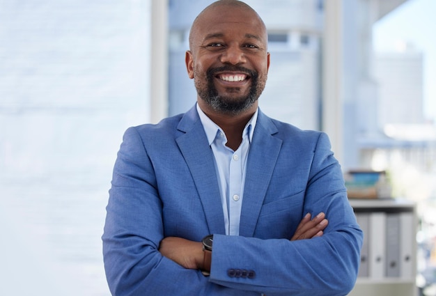 Happy black man arms crossed or business portrait of corporate motivation in company about us or profile picture smile confident or mature management person and success mindset or ceo introduction