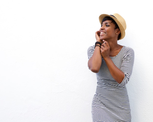 Happy black woman smiling with hat 