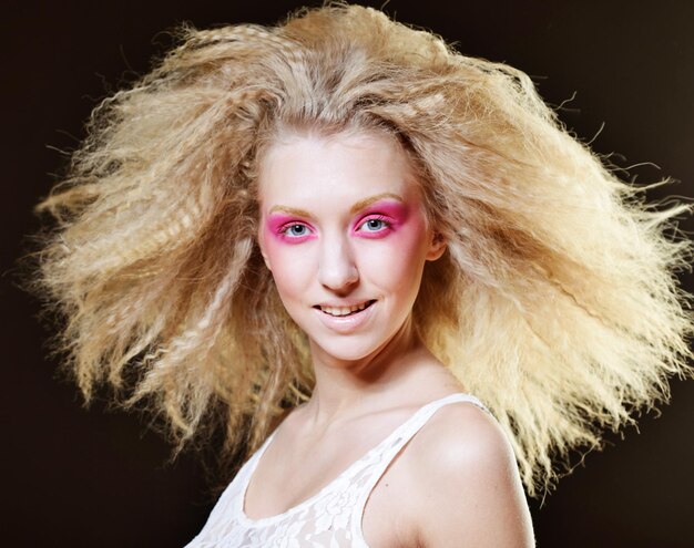 Happy blond with pink make up