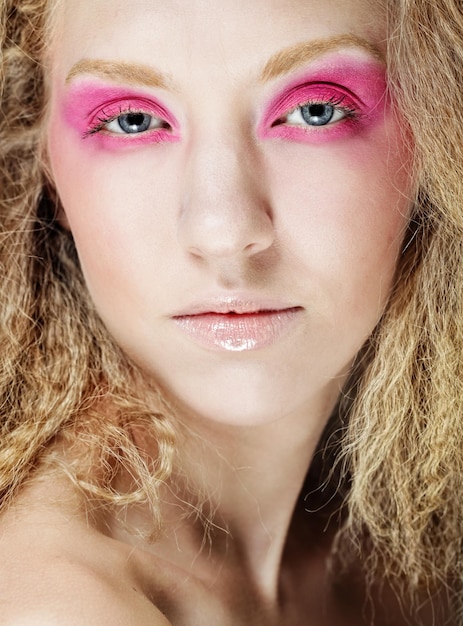 Photo happy blond with pink make up