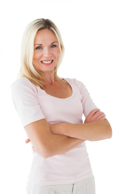 Happy blonde smiling with arms crossed