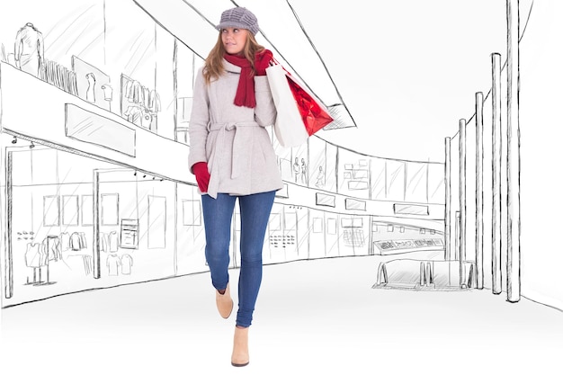 Happy blonde in winter clothes with bags against sketch design of a mall