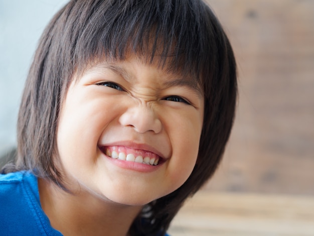 Happy boy child is smiling enjoying life. happy family concept.