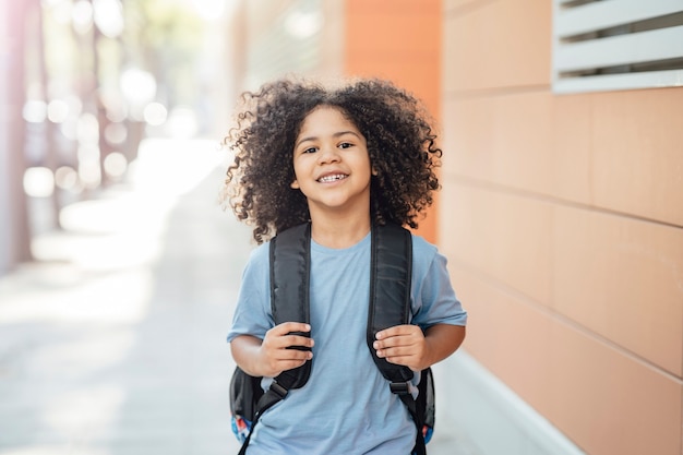 Happy boy on the way back to school