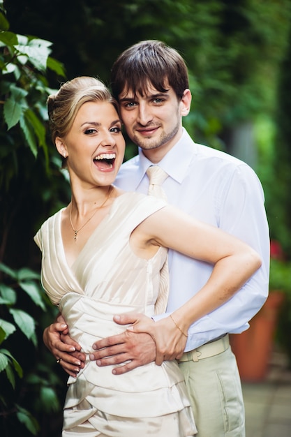 Happy bride and groom having fun