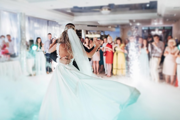 Happy bride and groom their first dance