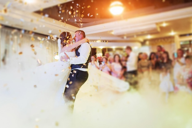 Happy bride and groom their first dance