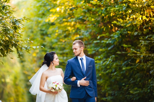 Happy bride holding hands