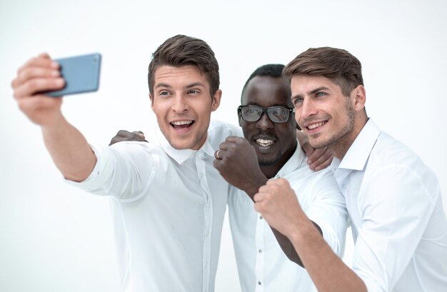 Happy business colleagues taking selfies