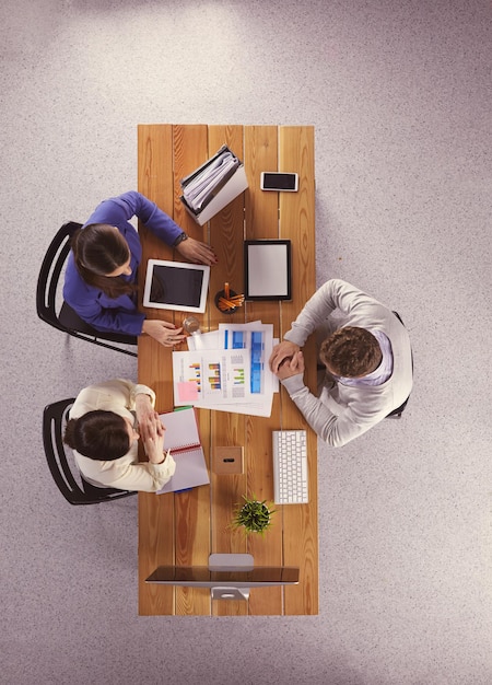 Happy business people talking on meeting at office