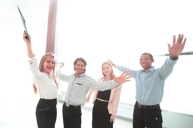 Happy business team in the background of the office