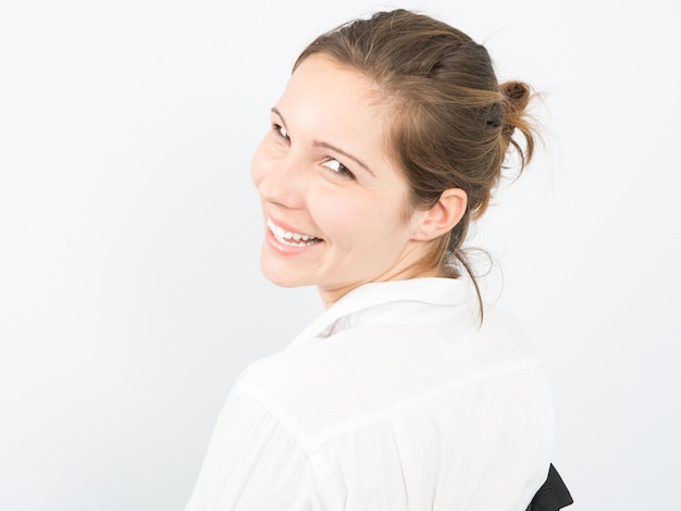 Photo happy business woman smiling isolated over a white background