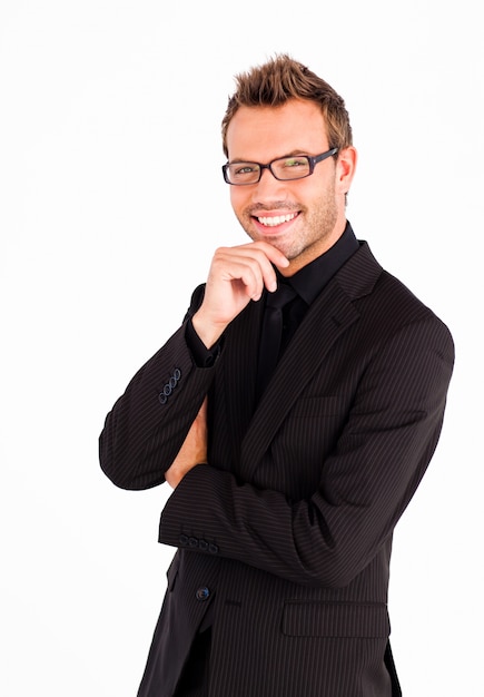 Happy businessman with glasses looking at the camera 