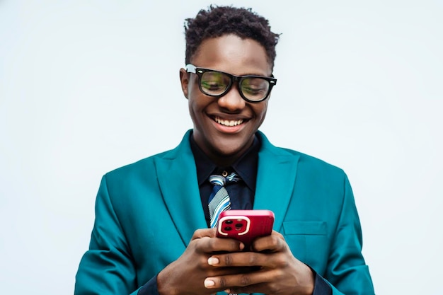 Happy businessman with smile using mobile technology and social media for project work