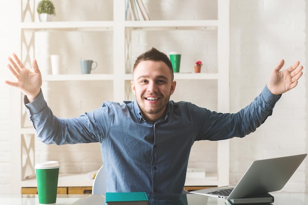 Happy businessman at work