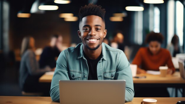 Happy Businessman Working in a Coffee Shop on his Laptop Computer