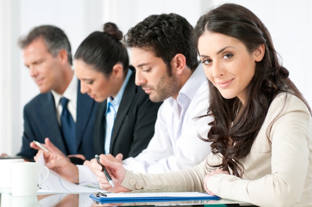 Happy businesswoman in office